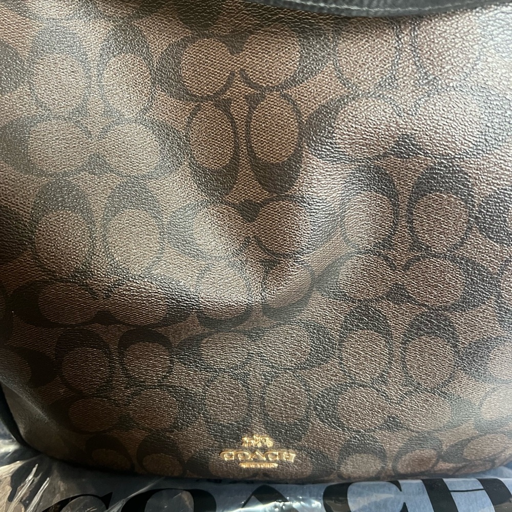 Coach bag black and brown shoulder or crossbody great condition